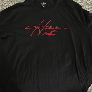 black hollister long sleeve, with red on arm and front!